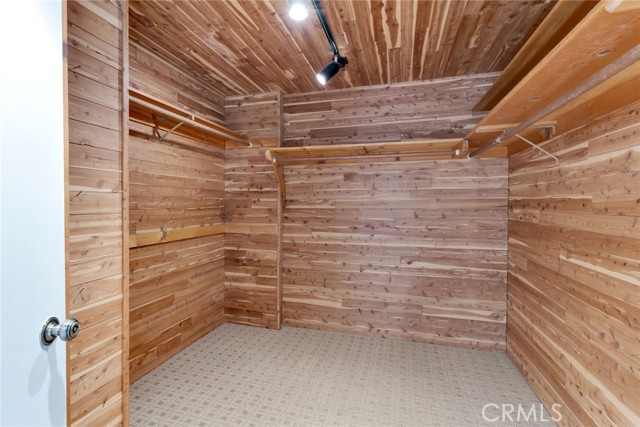 Cedar lined his and hers walk-in closets.