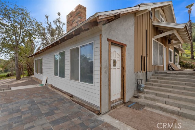 Front door, leads into kitchen
