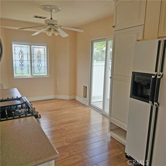 Sliding glass door leads to side yard