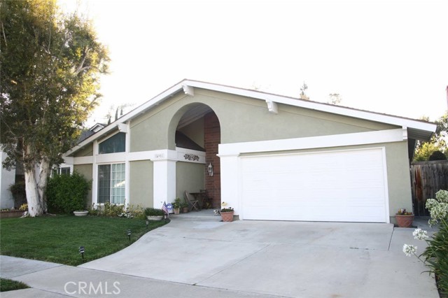 14901 Braeburn Road Tustin, California Highly upgraded and remodeled Single Story 3 Bedroom 2 Bath Tustin Meadows home. Gourmet Kitchen has Custom Solid Cherry Cabinets and Granite counters. Upgraded Appliances including Gas Stove and Oven (not often found in Tustin Meadows). Recessed lighting with dimmers. Newer dual pane windows throughout the home. Brand new wood flooring and carpet. Huge Great Room with romantic fireplace and Cathedral Ceilings. Spacious Main Suite with remodeled bath including shower stall. Built-in closet organizers. The 2nd Bath is remodeled with a spa bathtub. Both secondary bedrooms are a nice size as well. In addition to all this, you have a nice separate office space to work at home in privacy. Enjoy a nice large private yard great for entertaining friends and family. Association offers pools, spas, and a park.