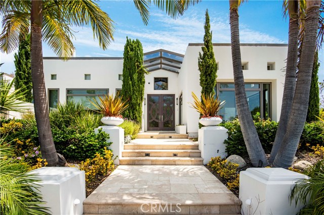 29 Sea Cove Drive Rancho Palos Verdes, California Prime opportunity to own a one of a kind, custom designed home in the community set above Abalone Cove. The house was brought down to studs and essentially rebuilt, including new electrical, plumbing, roof, etc. The interior has a modern flair alongside its coastal theme, as it utilizes natural woods and stone throughout. Fleetwood doors and windows adorn the openings and create an ideal indoor / outdoor flow. Gorgeous Onyx stone is a recurring element… The kitchen bar is back-lit onyx stone; the dining room has floor-to-ceiling onyx stone accents; the guest bath has one wall of onyx, and the family room has 2 bookmarked full onyx slabs, invisibly “floating" on the wall. The kitchen is a work of art that includes a 6 burner Viking stove, separate oven, a Subzero refrigerator and freezer, built-in Espresso/Cappuccino maker and hand-crafted cabinets. The enchanting master-suite includes a custom fireplace and luxurious master bathroom. Wander upstairs to discover an open, “loft-like” living space that leads to the oversized upstairs deck with outdoor kitchen, including pizza oven and fire pit. The spacious garage has room for four cars and includes two custom built, aluminum garage doors. The house includes a Lutron system that controls lighting and music which can be controlled via remotes, iPad or phone. TV projector w/ 10-foot screen, incredible gardens and landscaping, 3 A/C units, and so much more…