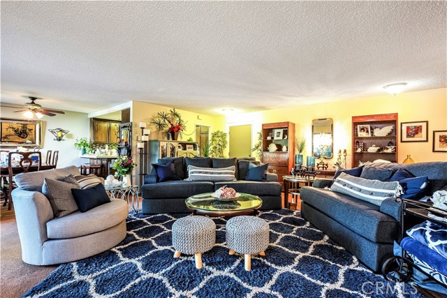 The Living Room Adjoins the Generous Dining Room Area and the Kitchen.