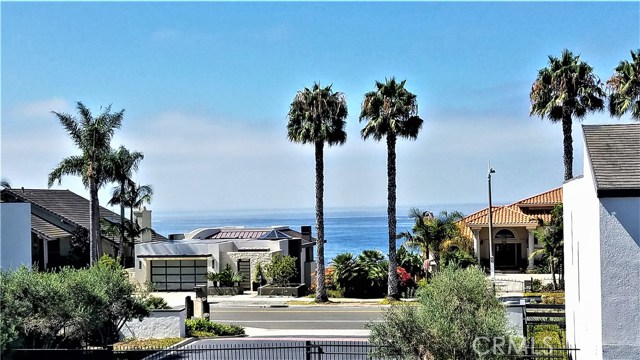 35236 Camino Capistrano 8 Dana Point, California Location, Location, Location! Fabulous Camino Capistrano Condo with Ocean Views from both levels includes three bedrooms, updated kitchen, huge master retreat and attached two-car garage. The gated development of Marbella Racquet Club includes a beautiful association pool/spa area plus private tennis court, all across from the famous Capistrano Beach bluff overlooking the gorgeous Dana Point Marina. Enjoy two private ocean view decks --one from the dining room and one from the master. Inside second floor laundry hook-ups are available. This location boasts wonderful walking trails with access to the shoreline and nearby shopping opportunities. Award-winning schools make this a highly desirable Capistrano Beach location with nearby Pines Park.
