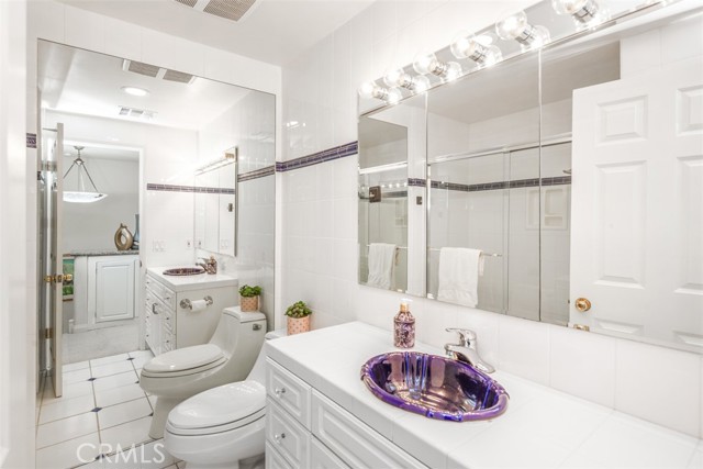 Third floor hallway bathroom has a bathtub shower