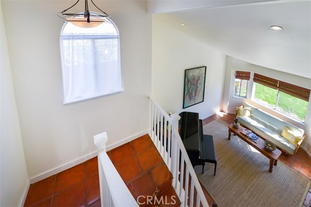 Shot of the living room showing the high ceilings.