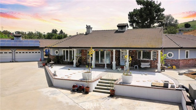4542 Soto Street Riverside, California Amazing opportunity to own this Beautiful custom built home, Horse property with 41,817sqft/.96 acre Lot size! This home has 4 bedrooms 2 1/2 Bath room, with an great open floor plan, the office with the closet can be use as the 4th bedroom. Spacious family room that features a fireplace, Wet bar with built in sink, many windows with views of the front yard. Main suite has a fireplace, sliding door to side back patio, master bathroom with sunken bath, shower, dual vanity and walk in closet. Dual pane windows provide excellent soundproof. Built-in Central vacuum and intercom/radio systems in every room, including the exterior. Formal dining room with lots windows overseeing the front yard, and breakfast nook, 3 car garage, Big driveway with lots of parking and RV parking, Front yard has a beautiful garden and fishpond. Lot offers space to built a pool, horse stalls and arena. Home is equipped with solar panels. Situated on a private road this beautiful home has the feel of a country in a City setting. Close to schools, shops, restaurants, entertainment and minutes away from freeways.