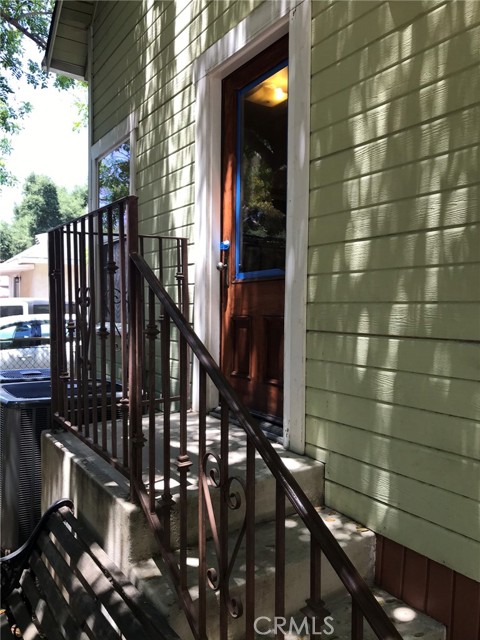 Close up of side entry with added railing.