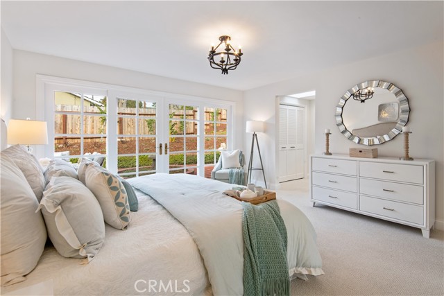 Main bedroom with two closets areas and ensuite bath