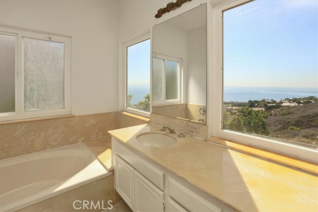 Master bath has a separate bath and shower.