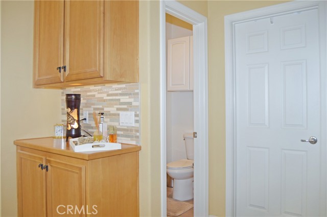 Linen Cabinet, Water Closet and Walk-in Closet Entry