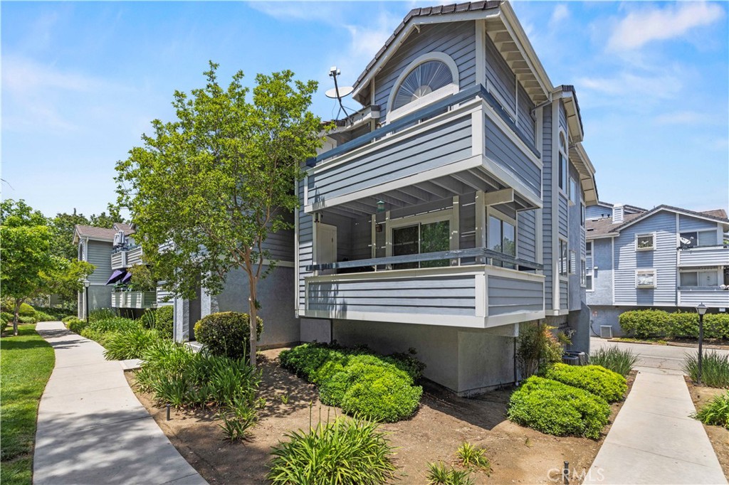 Beautifully updated 3 bedroom, 2 bathroom Canyon Country condo with 1,000 sq ft of living space, located in a quiet and well-maintained community. This upper unit features vaulted ceilings, abundant natural light, and a spacious loft with a large walk-in storage closet. The remodeled kitchen includes stainless steel appliances, quartz countertops, recessed lighting, and bar seating. Both bathrooms have been tastefully upgraded with modern finishes. Additional highlights include a full-size washer and dryer inside the unit and a 2-car tandem garage with ample storage space. Great location in the community close to HOA pools, spas, tennis courts, and playground. Move-in ready and well maintained.