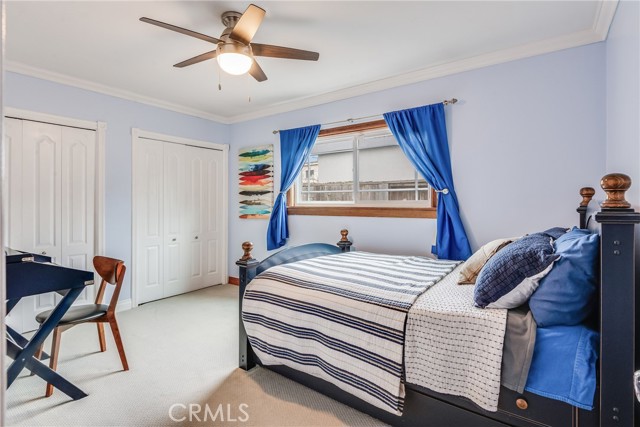 2nd guest bedroom with large closets, great light, ceiling fan and newer paint