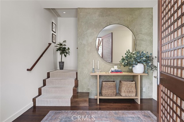 Entry, green wall and back stairwell