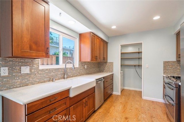 Large Farm sink and Cork flooring.