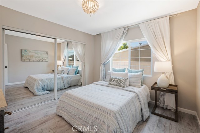 Light and bright second bedroom with big closet.