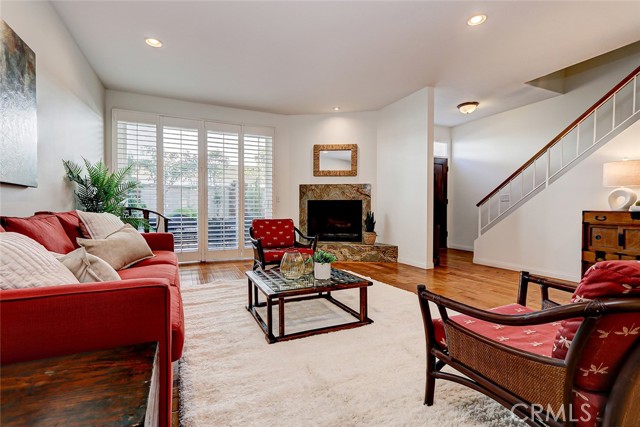 Living room open to sunny patio!