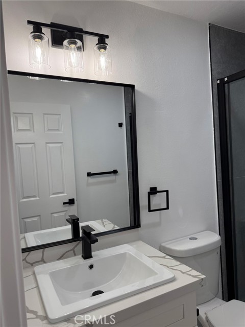 Detail Gallery Image 15 of 23 For 215 S Sullivan Ln #220,  Santa Ana,  CA 92704 - 4 Beds | 2 Baths