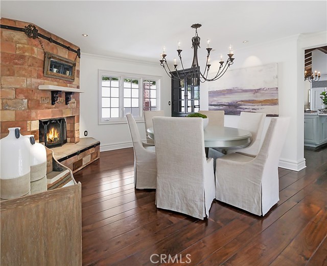dining room with reclaimed terra-cotta tile on the fireplace
