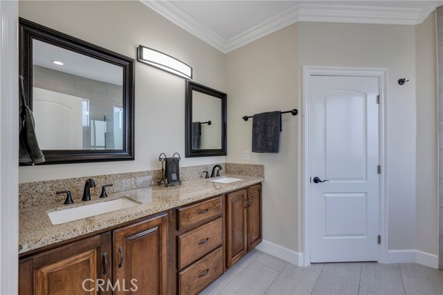 Primary en suite bath boasts dual sinks.