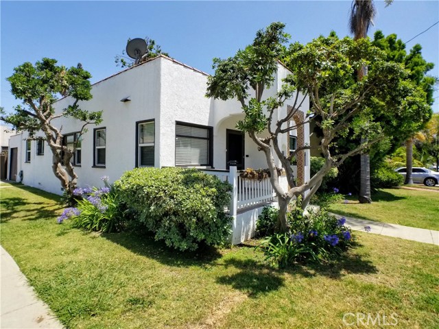 1390 Bennett Avenue Long Beach, California Lovely 2 bedroom, 1 bath single family home located on a corner lot in desirable Long Beach location near Recreation Park & Golf Course. The interior of the home features beautifully refinished hardwood floors, a formal dining area and an updated kitchen that includes a stove and dishwasher. Both bedrooms are nicely sized and the bathroom has also been updated and expanded from it's original size. There are plenty of built-in shelving and blinds at every window. There are ceiling fans in each room and the expanded kitchen comes equipped with a stove and a large eating area, that connects to a sliding glass door that opens to a covered deck and BBQ area. There is a single car garage with a remote opener, washer/dryer hook-ups and space for storage.