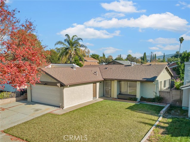 Appealing, ranch-style, 3 bed, 2 bath, 1,160 sq ft home in quiet, residential neighborhood of Simi Valley.  Entry opens directly into bright, sunny living room with large picture windows.  Step through into large, eat-in Kitchen with ample room for a breakfast/dining area and a sliding glass door out to the back patio.  Down the hall are three good sized bedrooms which share a hall bath.  The sizable primary bedroom has a private, en-suite, ¾ bathroom.  Out back is a wide covered patio, perfect for hosting gatherings, BBQs, or dining al fresco, and an expanse of lawn with planters along the fence, waiting for you to plant with vegetables, trees, greenery, or flowers to make the space your own.  Additional features include attached 2-car garage with laundry hookups and pedestrian door.  Prime location in central Simi, close to Sequoia Park, Santa Susana High School and Garden Grove Elementary, and well situated near shops, restaurants, entertainment, recreation, and major transportation corridors.  Make this home your own!