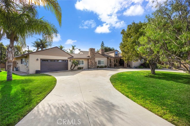 Stunning 4-Bedroom Home with Pool & Separate Casita in Prime Yorba Linda Location.

Welcome to this gorgeous 4-bedroom, 2.5-bath home nestled on a sprawling, nearly 30,000 square foot flat lot in the highly sought-after city of Yorba Linda. Offering both space and luxury, this meticulously maintained residence features an expansive layout perfect for family living and entertaining.

As you step inside, you’re greeted by a bright and airy open floor plan with high ceilings, rich hardwood floors, and large windows that allow natural light to pour in. The spacious living and dining areas flow effortlessly into the gourmet kitchen, complete with stainless steel appliances, and plenty of cabinetry for all your culinary needs.

The cozy family room with a fireplace is perfect for relaxing.  Step outside to discover the sparkling pool, surrounded by lush landscaping, making this your very own slice of paradise. Whether hosting summer BBQs or enjoying a peaceful evening swim, this outdoor space is sure to impress.

The luxurious master suite offers a serene retreat with a walk-in closet and a spa-like en-suite bath with a soaking tub, separate shower, and dual vanities. Three additional well-sized bedrooms provide plenty of space for family, guests, or home office needs.

In addition to the main home, this property also boasts a charming, almost 600 square foot 1-bedroom casita complete with its own kitchenette, perfect for guests, extended family, or as a potential rental for added income.

Located in the heart of Yorba Linda, this home is just minutes from excellent schools, parks, shopping, dining, and easy access to major freeways. With nearly an acre of flat land, a beautiful pool, and a guest casita, this is truly a rare opportunity to own a piece of paradise.

Don’t miss out on this exceptional property—schedule your tour today!