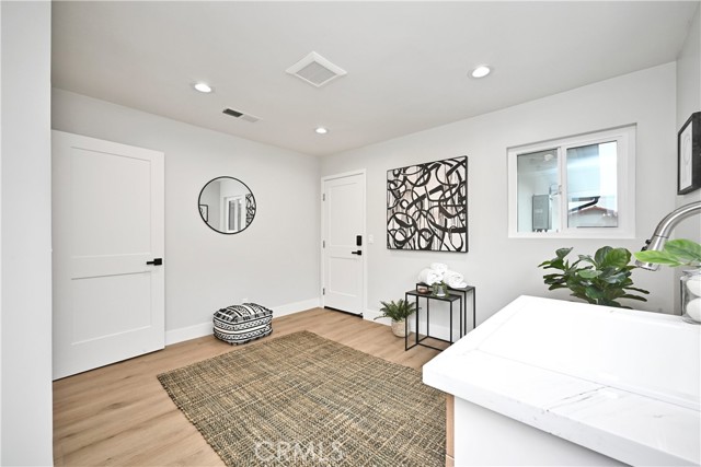 Laundry Room w/ Garage Door