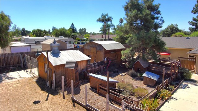 Two sheds, one with electricity and enclosure for small animals