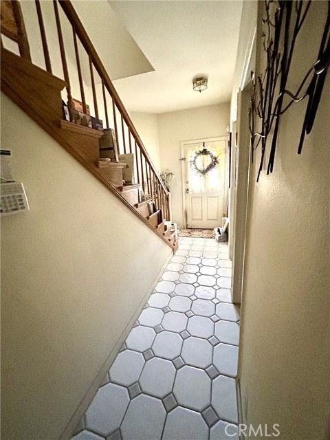 Entry hallway leads to 2 bedrooms, bathroom and laundry room