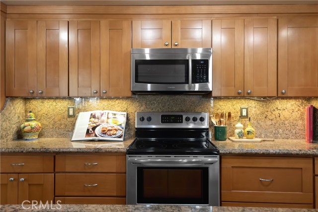 Beautiful granite counters & lots of storage cabinets