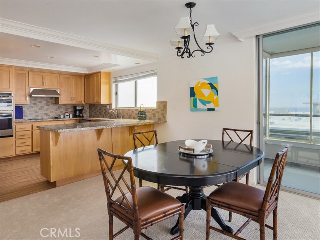 Kitchen with Breakfast bar flows to Dining area - all with ocean and Catalina views.
