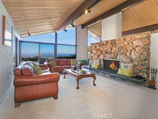 Living Room with Fireplace Looking Out to View