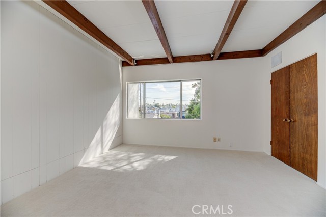 Primary Bedroom with Tree Top Views