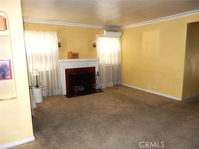 Large living room with fireplace.