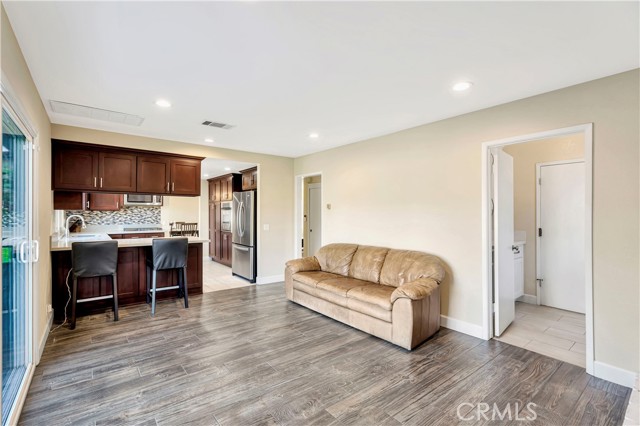 Laundry area by living room