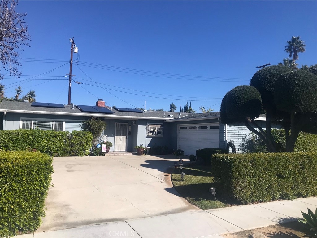 1641 Rainbow Drive Santa Ana, California Tastefully updated home nestled in close proximity to shopping and schools. This home consists of update flooring, two sided fireplace separating the
living room and formal dining room. Updated laminate flooring, with a very large modern kitchen. As you enter the backyard you'll find a very tranquil
park like setting of a backyard that was professionally done.