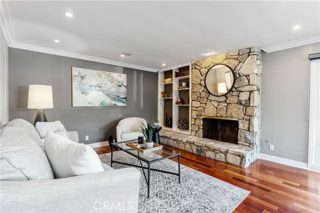 The PV Stone fireplace and built-ins adds to the charm of the formal living room.