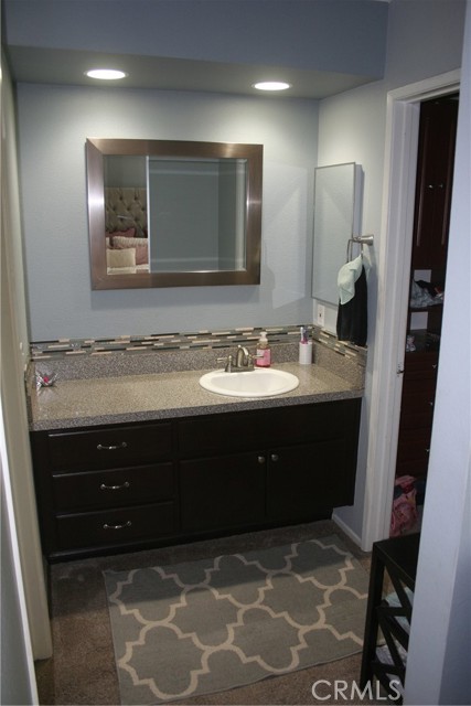 Vanity area off of primary bedroom.