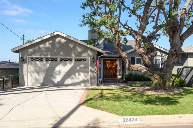 26428 Athena Avenue Harbor City, California Great home with city views located in the Harbor Pines neighborhood close to / adjacent to the Palos Verdes area. Features 3 BD and 2 Bath, an approx. 2,462 SF of living space, a formal living room, dining area and a family room on the lower level. There is a balcony on off the living room and large deck off the family room downstairs. The grassy backyard is neatly landscaped and overlooks views from the deck. Other features include an updated kitchen, two fireplaces, 2 garage spaces, large laundry room, easy access to the freeway, close to local shops and restaurants.