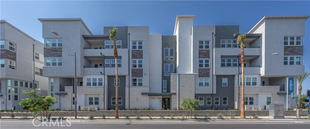 Experience the height of modern luxury living at 100 West in Anaheim, a stunning gated community crafted by the renowned luxury home builder, Toll Brothers. This exceptional residence boasts an inviting layout with 3 spacious bedrooms and 2 elegantly designed bathrooms, offering a generous 1,550 square feet of comfortable living space. As you step inside this corner unit, you’ll be greeted by an abundance of natural light that highlights the sophisticated recessed LED lighting throughout. The gourmet kitchen is a chef's dream, featuring exquisite Quartz countertops with a stylish upgraded backsplash, ample cabinetry for all your storage needs, and high-end stainless steel appliances that blend seamlessly with the sleek design. The thoughtful layout also ensures the unit is handicap-accessible, promoting inclusivity and ease of movement. Beyond your doorstep, the community offers a wealth of amenities that elevate your living experience. Enjoy a refreshing dip in the sparkling pool, unwind in the soothing spa, or take your furry friends to one of the two spacious dog parks. The BBQ areas and beautifully landscaped recreational grass zones provide the perfect settings for gatherings with family and friends, while the meandering paseos invite leisurely strolls through this picturesque neighborhood. Adding to the allure of this modern sanctuary is the significant advantage of NO MELLO-ROOS tax and low HOA fees, making it an even more attractive place to live. Nestled conveniently near iconic attractions such as Disneyland, Honda Center, Angel Stadium, and the vibrant Anaheim Packing District, this home offers the perfect blend of luxury, convenience, and lifestyle.