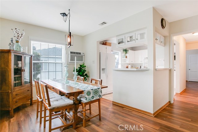 Farmhouse-inspired Dining area connects to a beautiful, upgraded Dream Kitchen.