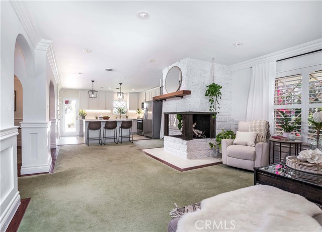 looking North... from the living room, past the fireplace into the kitchen... a great room feel!