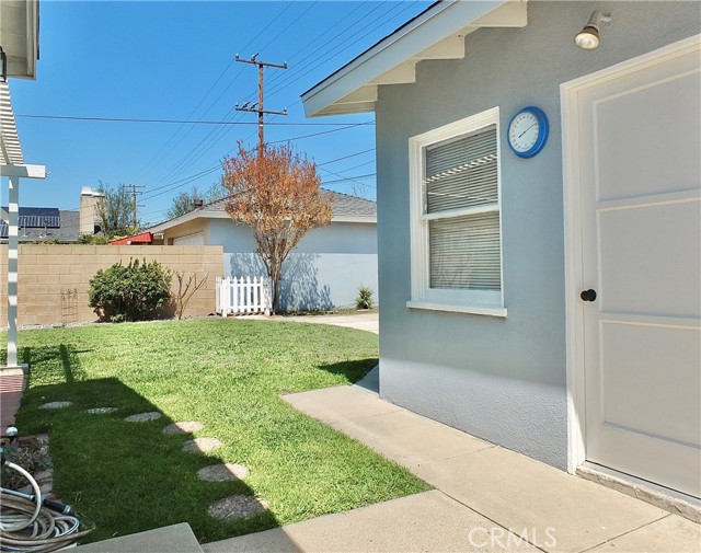 Individual laundry room w/window is attached to the garage