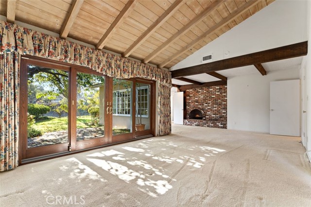 Doors open out to the secluded patio with canyon views.