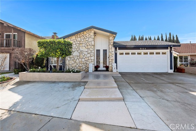 5122 Dutcher Avenue Irvine, California Located in the heart of Irvine, this single level charmer has 3 bedrooms and 2 baths. Situated on a large lot with an inside tract location, the Home has Large Paved Side Yards perfect for gardening and entertaining. Recent upgrades include scraped ceilings, crown molding, tile flooring, new windows with Plantain Shutters and new sliding glass doors. The remodeled Kitchen opens into the expanded Family Room with a gorgeous fireplace. Kitchen updates include granite counters and stainless steel appliances. Living Room features a beautiful Rock Fireplace. Two generous sized Bedrooms share a common hall Bath. The Master Suite has extra large sliding glass doors that lead into the backyard and let in the sunlight. Enjoy sunny days in the garden under the vinyl patio cover which is easy to maintain. Several fruit bearing trees in yard. Newly installed screen doors let you feel the cool breezes. The garage is equipped with a newer roll up garage door, built-in cabinets for storage and epoxy flooring. This home is in close proximity to the 5 freeway, Walnut Shopping Center, Heritage Park Community facilities, Woodbridge Lake and Woollett Aquatics Center used for training Olympic swimmers. Attend Award Winning Irvine Unified Schools!
