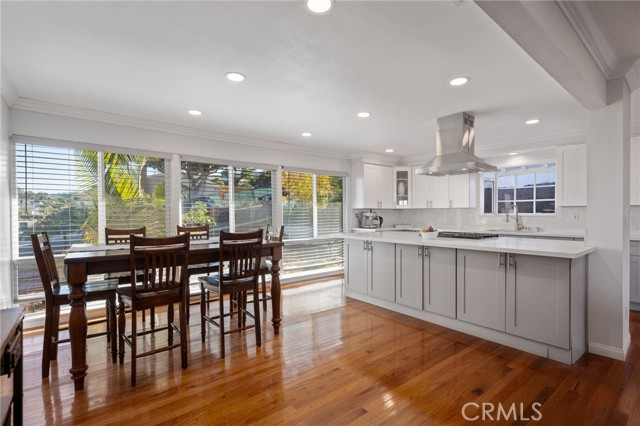 The kitchen seamlessly integrates with the living  and dining areas.