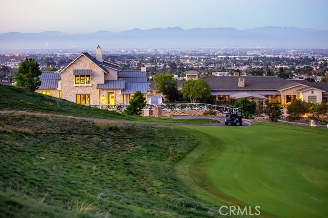 View from the homes overlooking the country club, city and mountains.