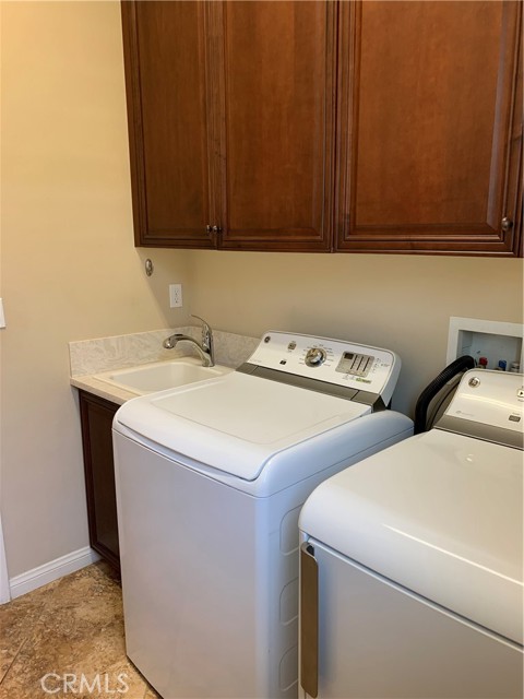 laundry room washer/dryer with sink