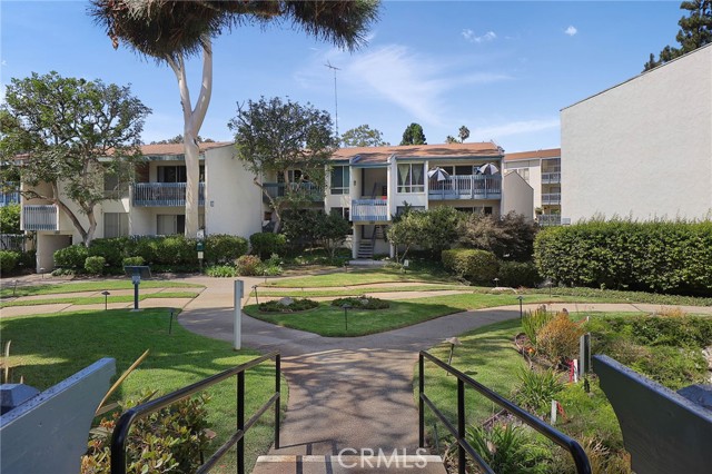 Walkways and paths that are surrounded by the greenery and trees of Brookside Village.