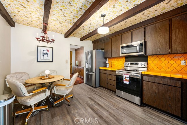 Main unit kitchen with new flooring and appliances
